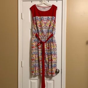 Sleeveless dress with tie waist